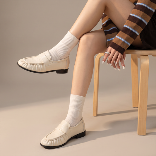 Nell Pennyloafers met Glanzende Afwerking