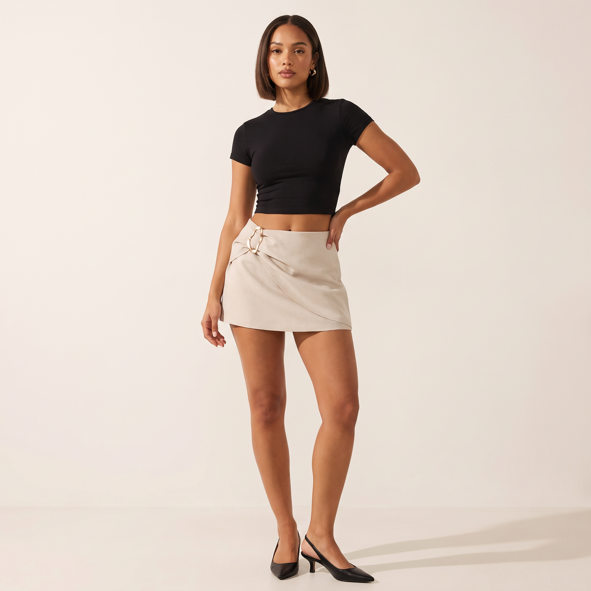 Avenna skort met overslag en ringdetail
