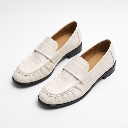 Nell Pennyloafers met Glanzende Afwerking