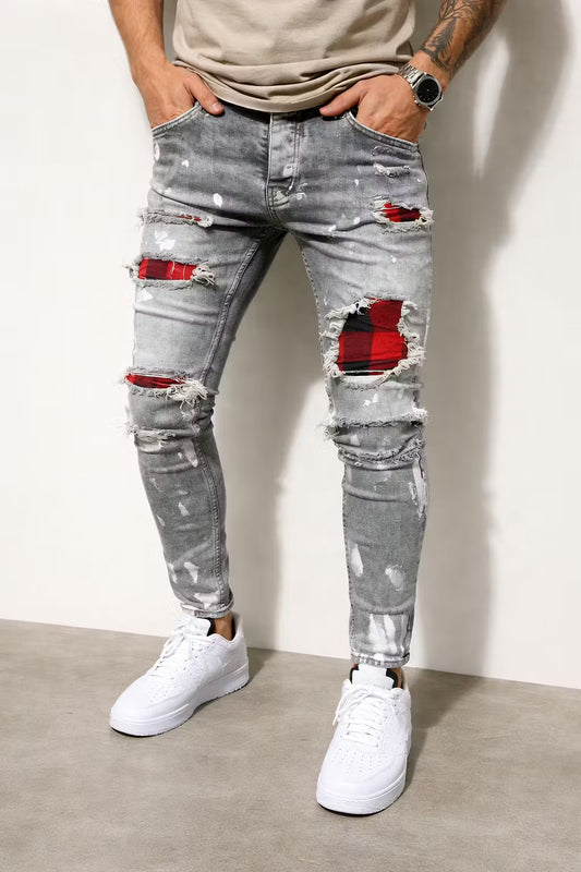 Grijze versleten jeans met patches