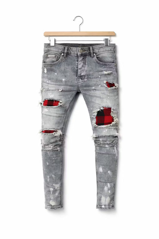 Grijze versleten jeans met patches