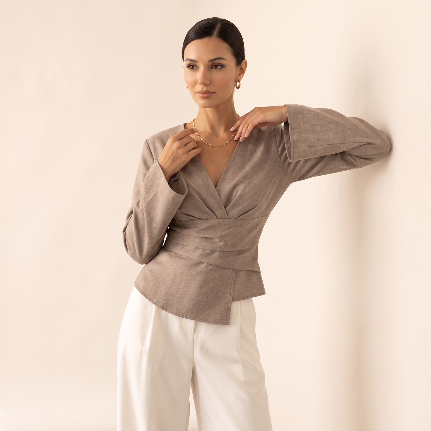 Norell top met gedrapeerde taille