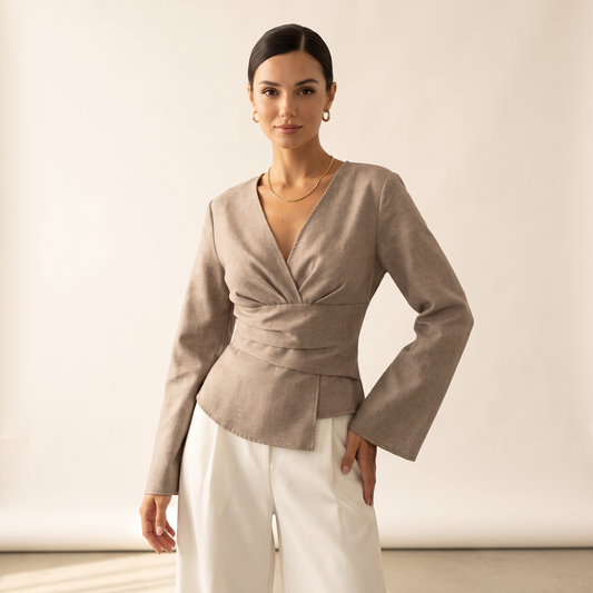 Norell top met gedrapeerde taille