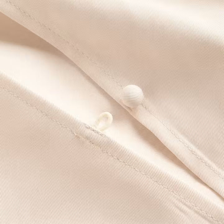 Amara romper met gedrapeerde schouders