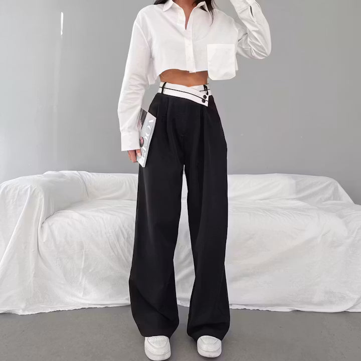 Vesper broek met contrasterende tailleband en wijde pijpen