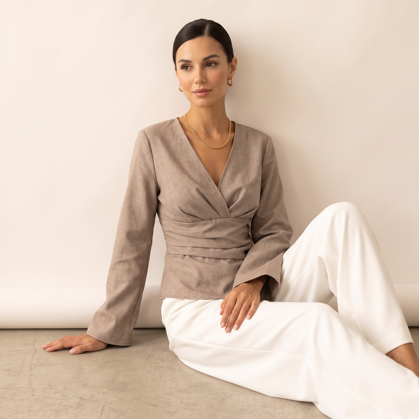 Norell top met gedrapeerde taille