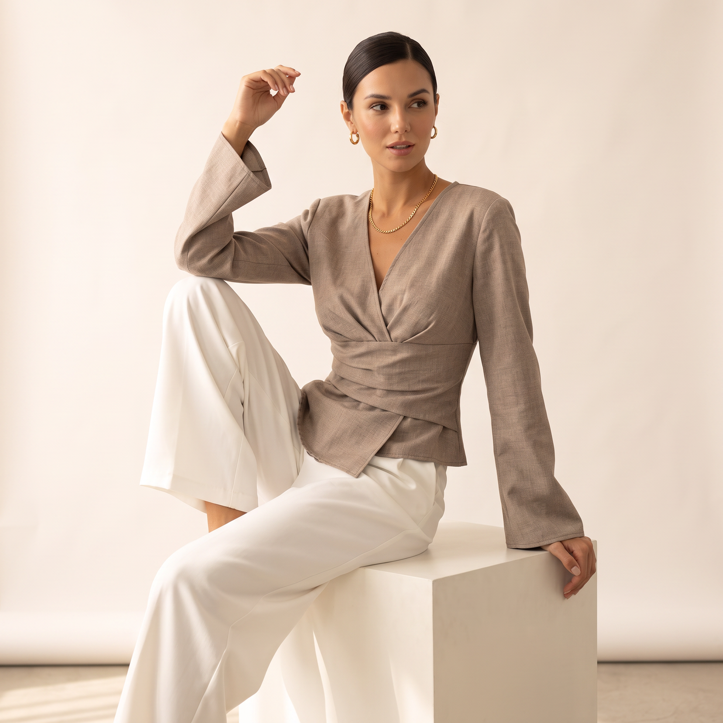 Norell top met gedrapeerde taille