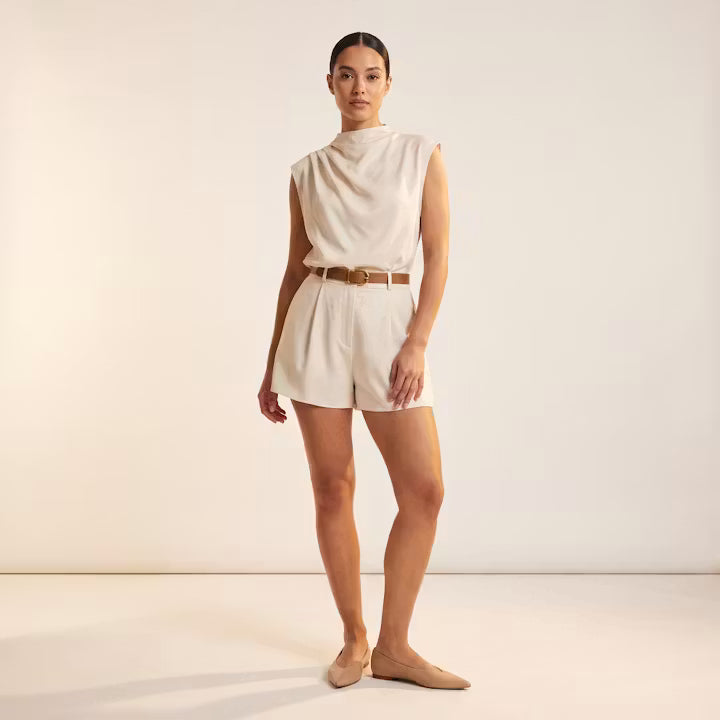 Amara romper met gedrapeerde schouders