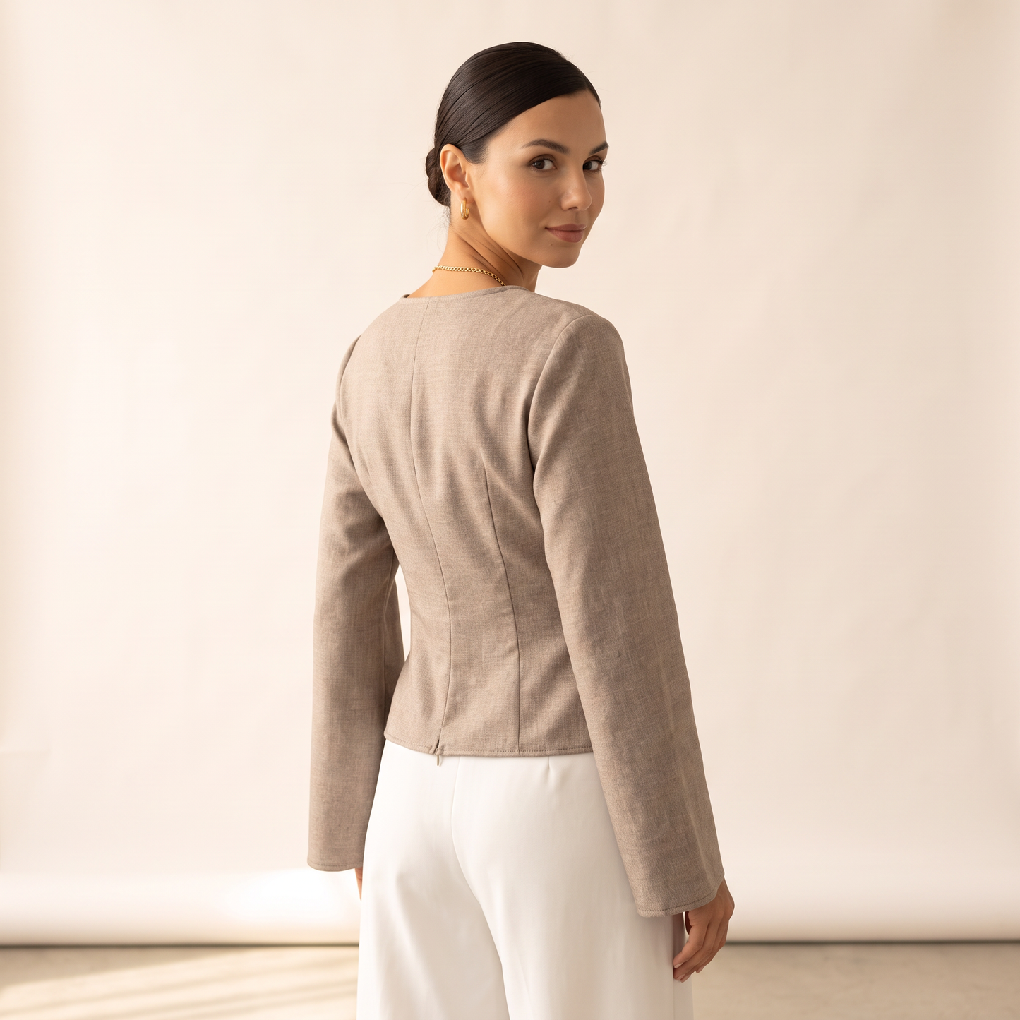 Norell top met gedrapeerde taille