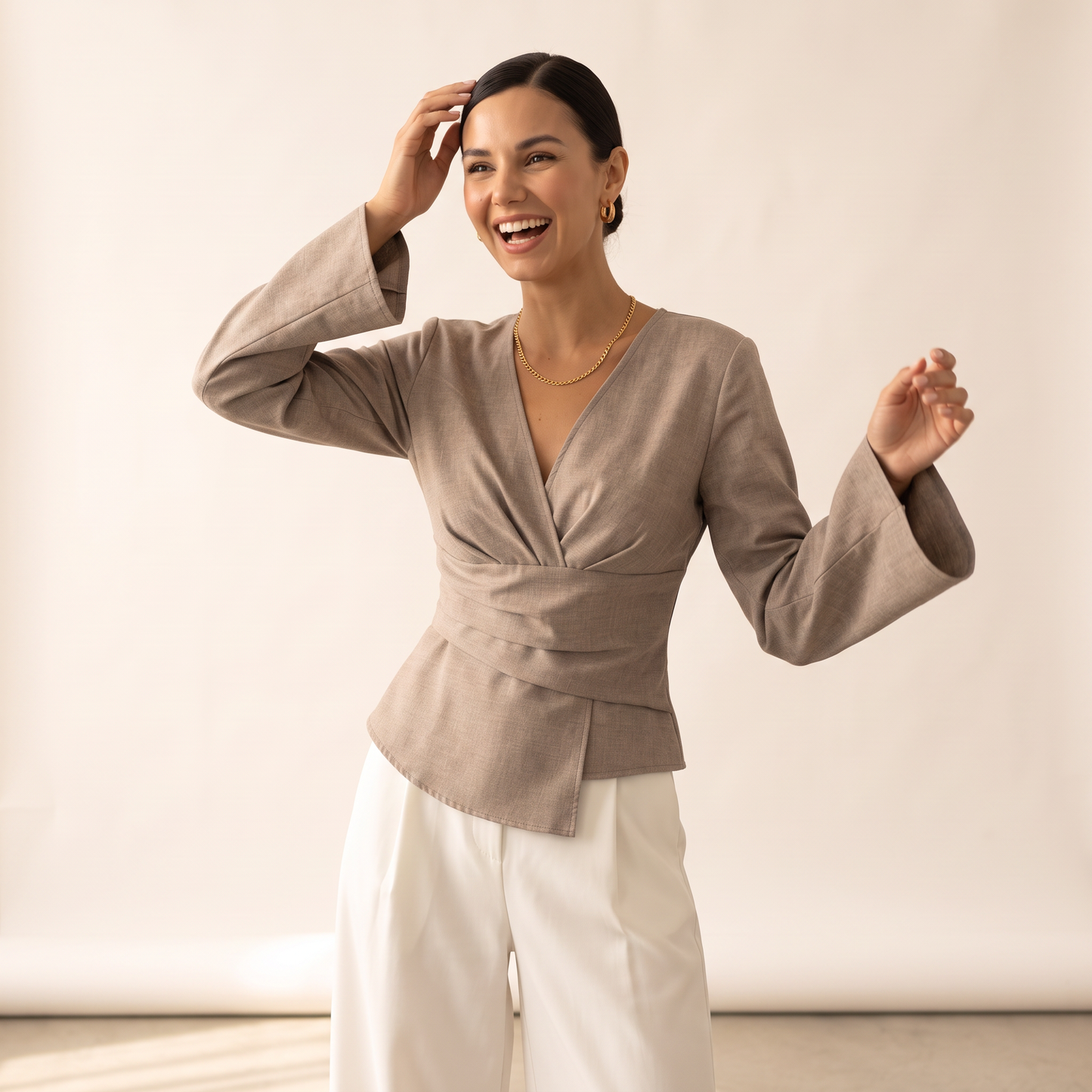 Norell top met gedrapeerde taille