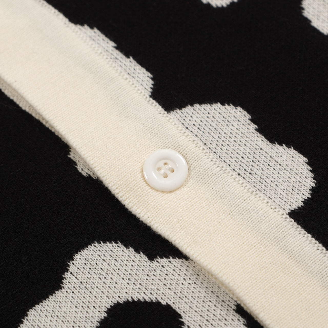 Men’s Black Knit Short Sleeve Polo Shirt With Abstract Floral Pattern