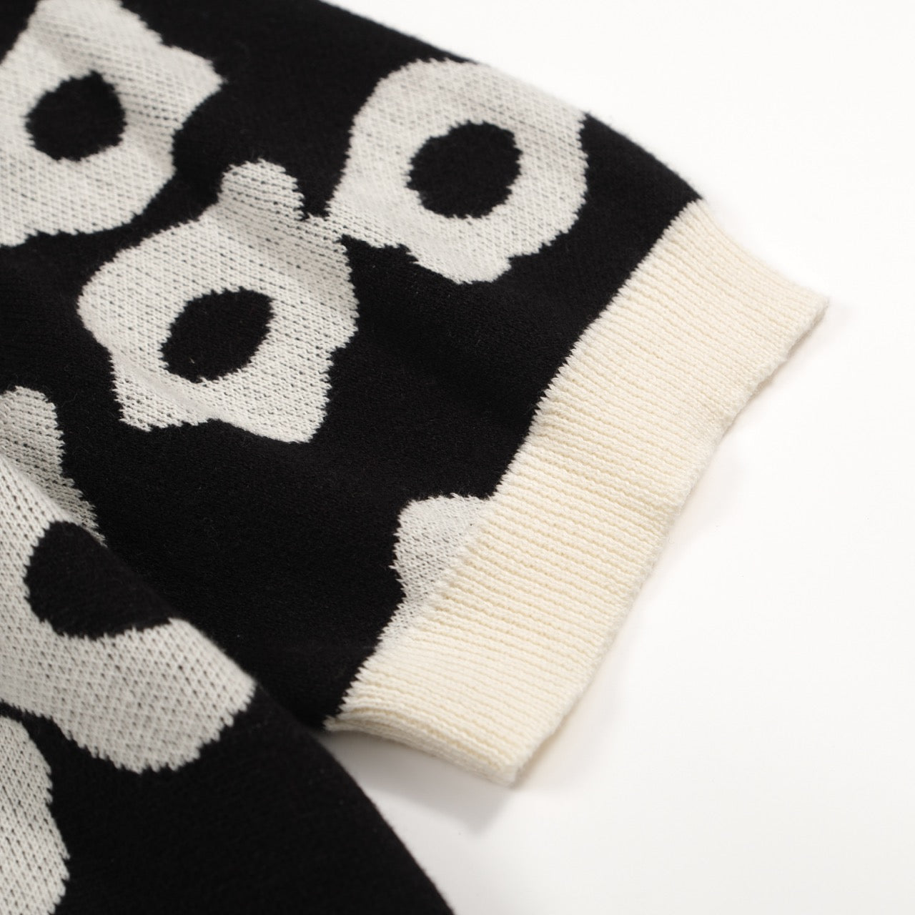 Men’s Black Knit Short Sleeve Polo Shirt With Abstract Floral Pattern